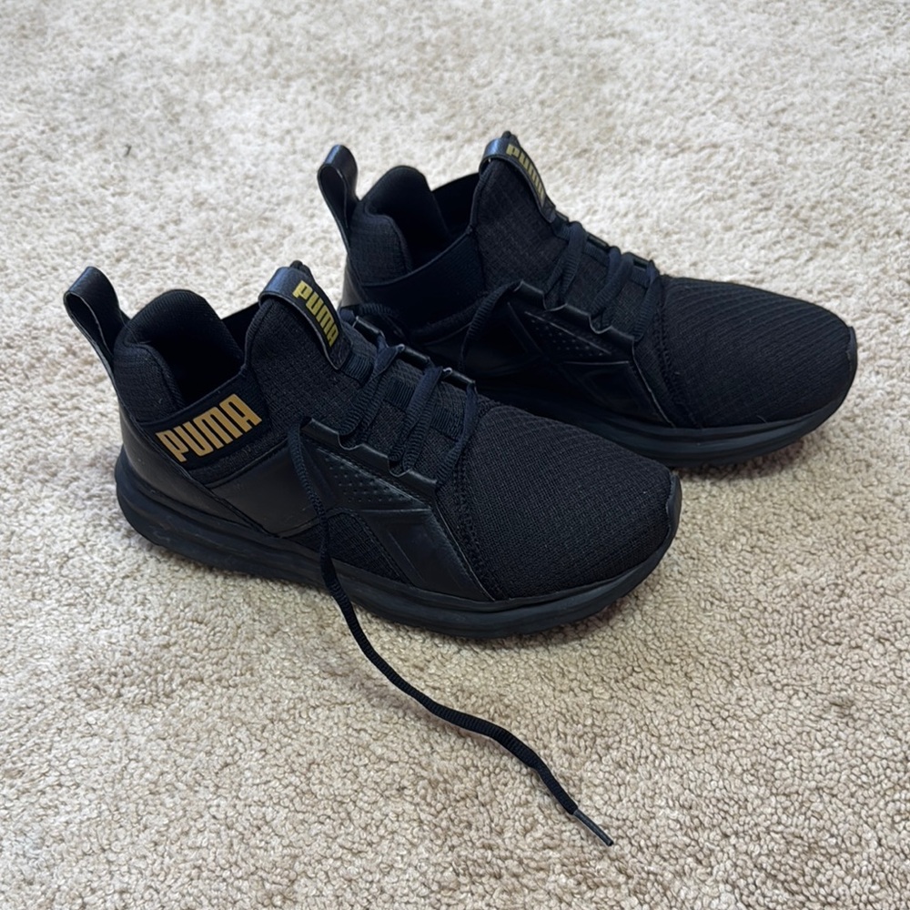 Puma Black Sneakers with Gold Accents